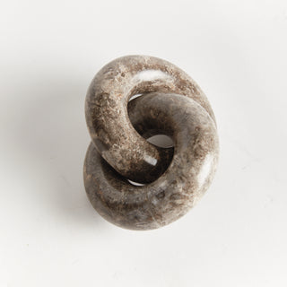 LINKED MARBLE RINGS SCULPTURE
